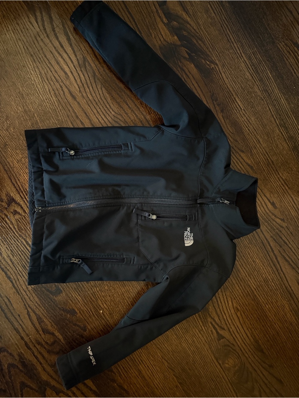 The North Face Kids Black Softshell Jacket with Zip Pockets